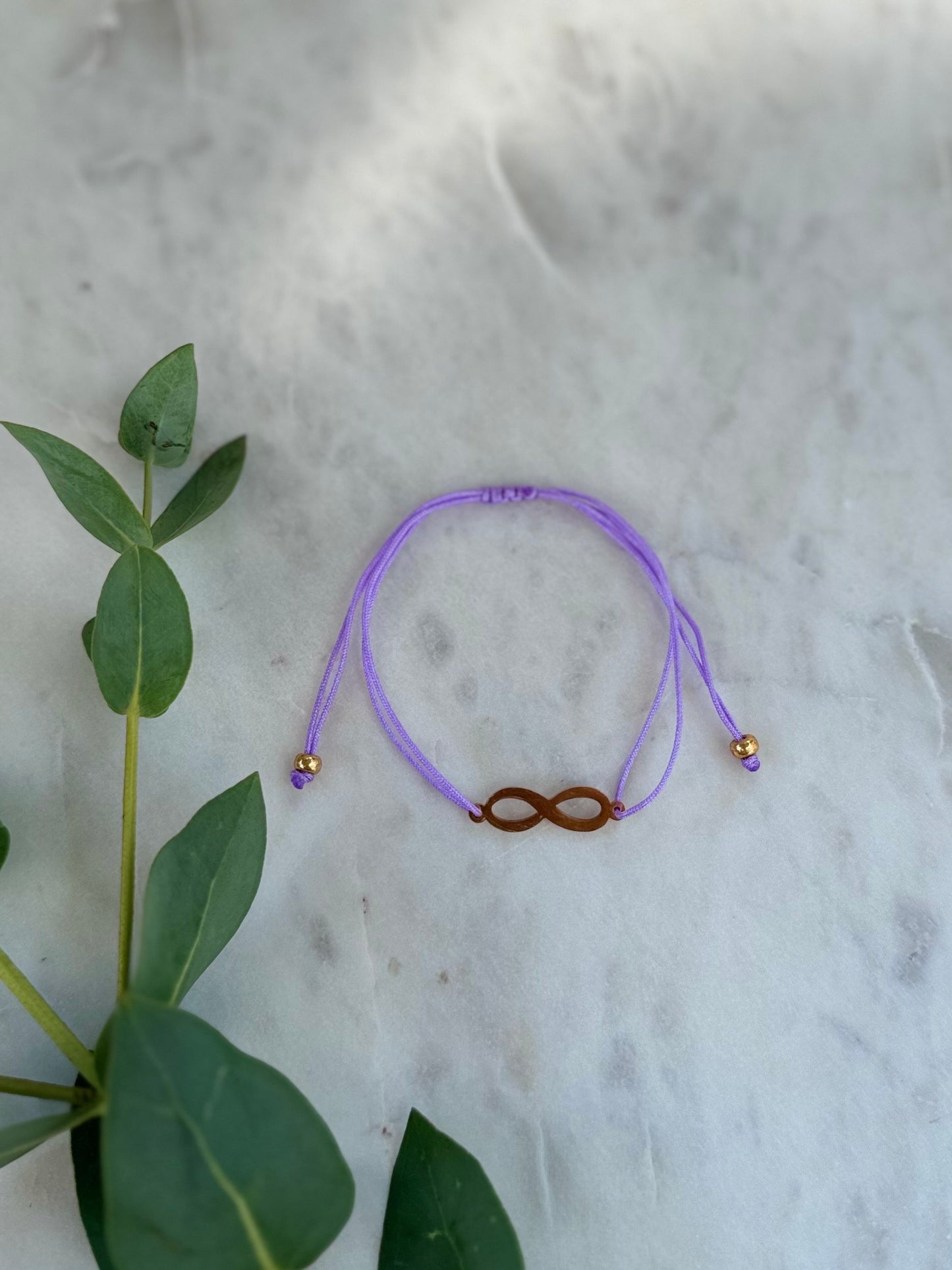 Zartes Infinity Armband handgefertigt Gold - Freundschaftsarmband bunt Ibiza Style